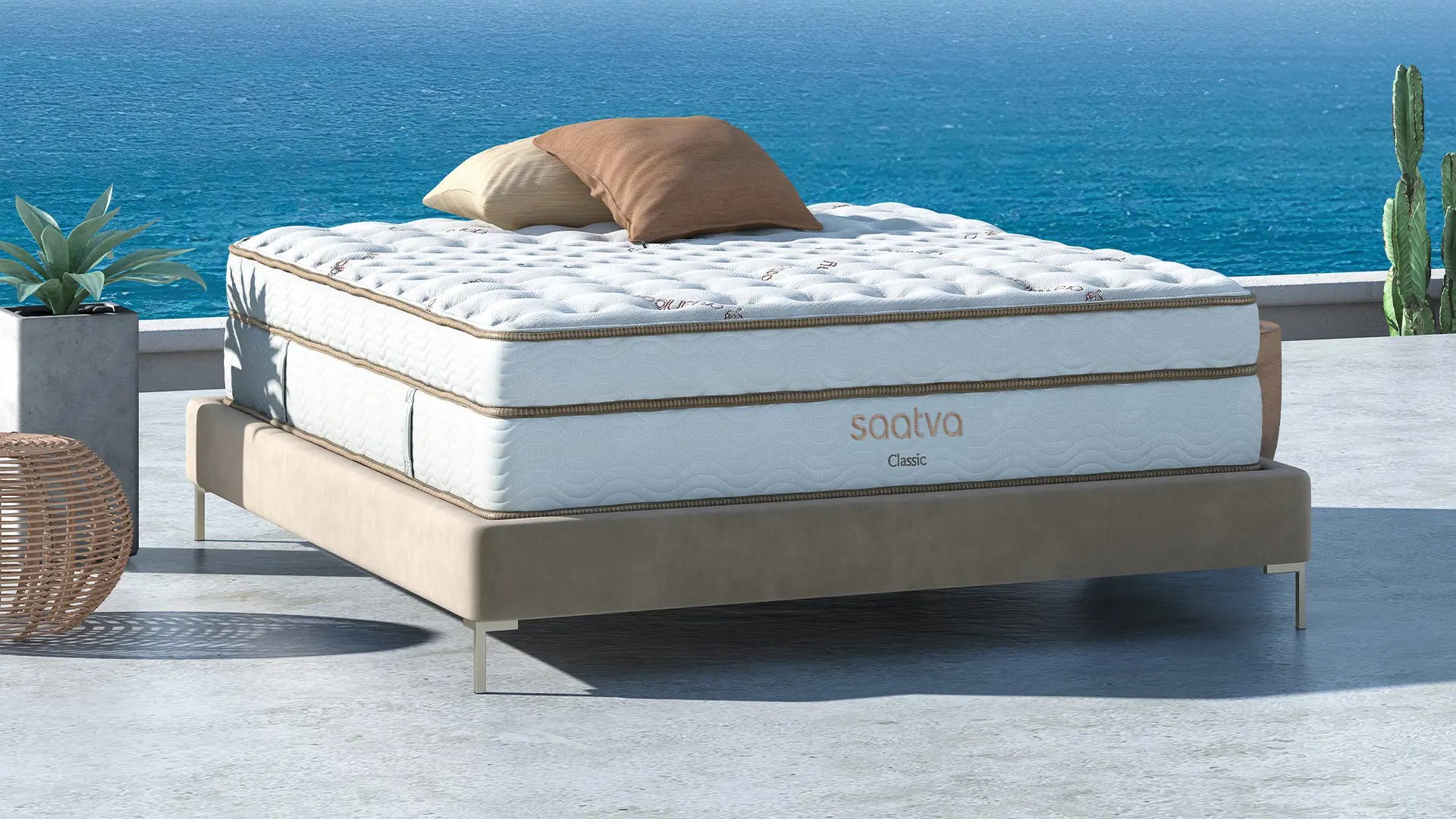 saatva mattress on a surface in front of the ocean
