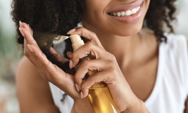 A Celeb Hairstylist Explains What to Look For in a Frizz-Fighting Spray That’ll Truly Smooth...