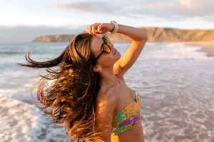 'I'm a Hairstylist, and This Is How to Keep Your Hair Healthy and Frizz-Free While You're Traveling'