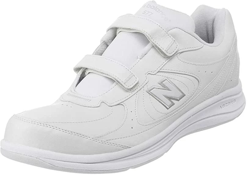 a white pair of new balance 577 shoes