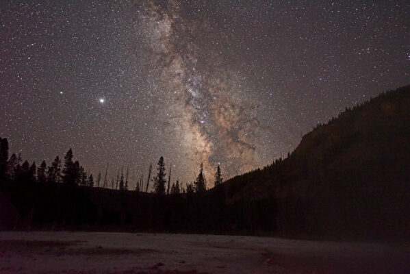 Late July Milky way rising over Emerald Pools in Yellowstone National Park.