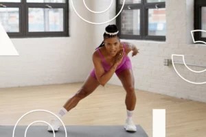 This 15-Minute HIIT Workout Involves 6 Standing Moves You Can Easily Do at Your Desk