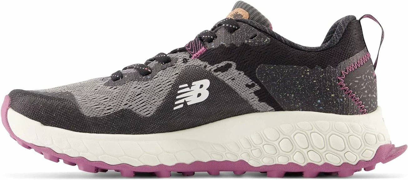 a grey and purple pair of new balance fresh foam hierro v7 sneakers