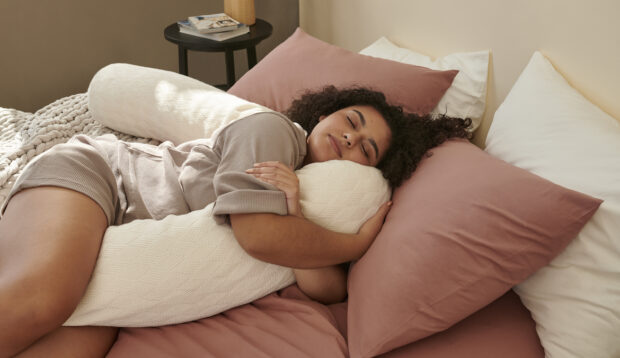 Bearaby Just Launched the Cuddliest Body Pillow To Melt Away All Your Morning Aches and...
