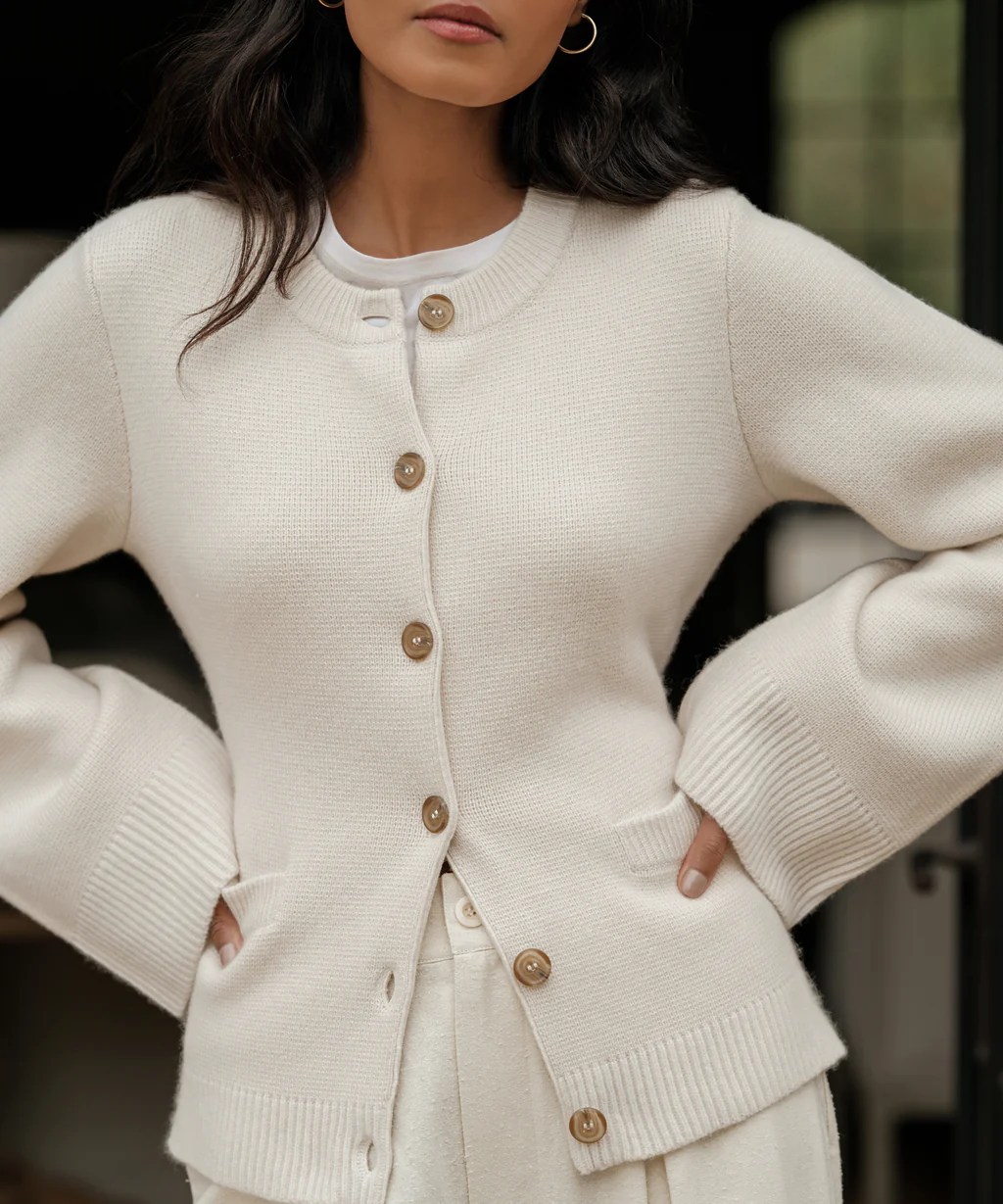 a white jenni kayne cooper cardigan sweater