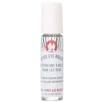 An off-white bottle of First Aid Beauty eye serum.