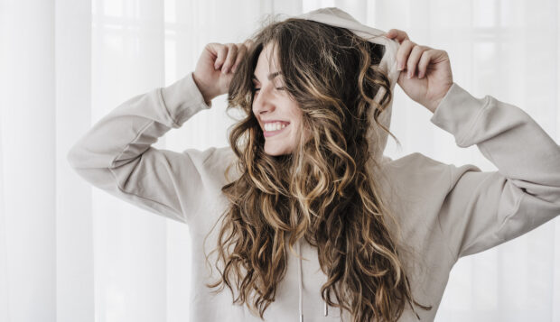 How To Keep Wavy Hair Looking Fresh—Never Flat—With Fewer Weekly Washes
