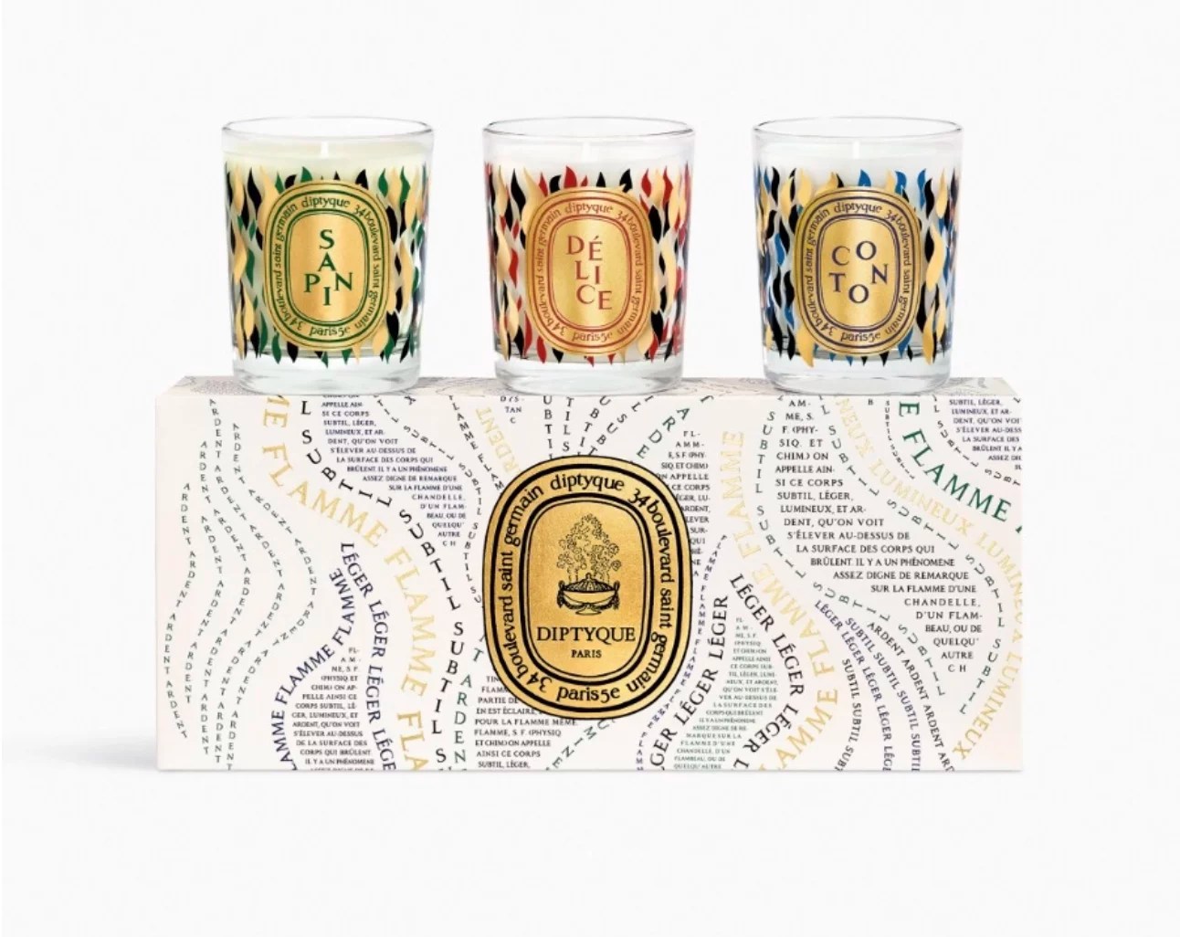 a set of 3 diptyque holiday candles, best sister in law gifts