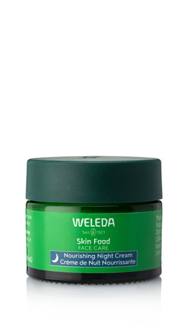 A green jar of Weleda night cream.