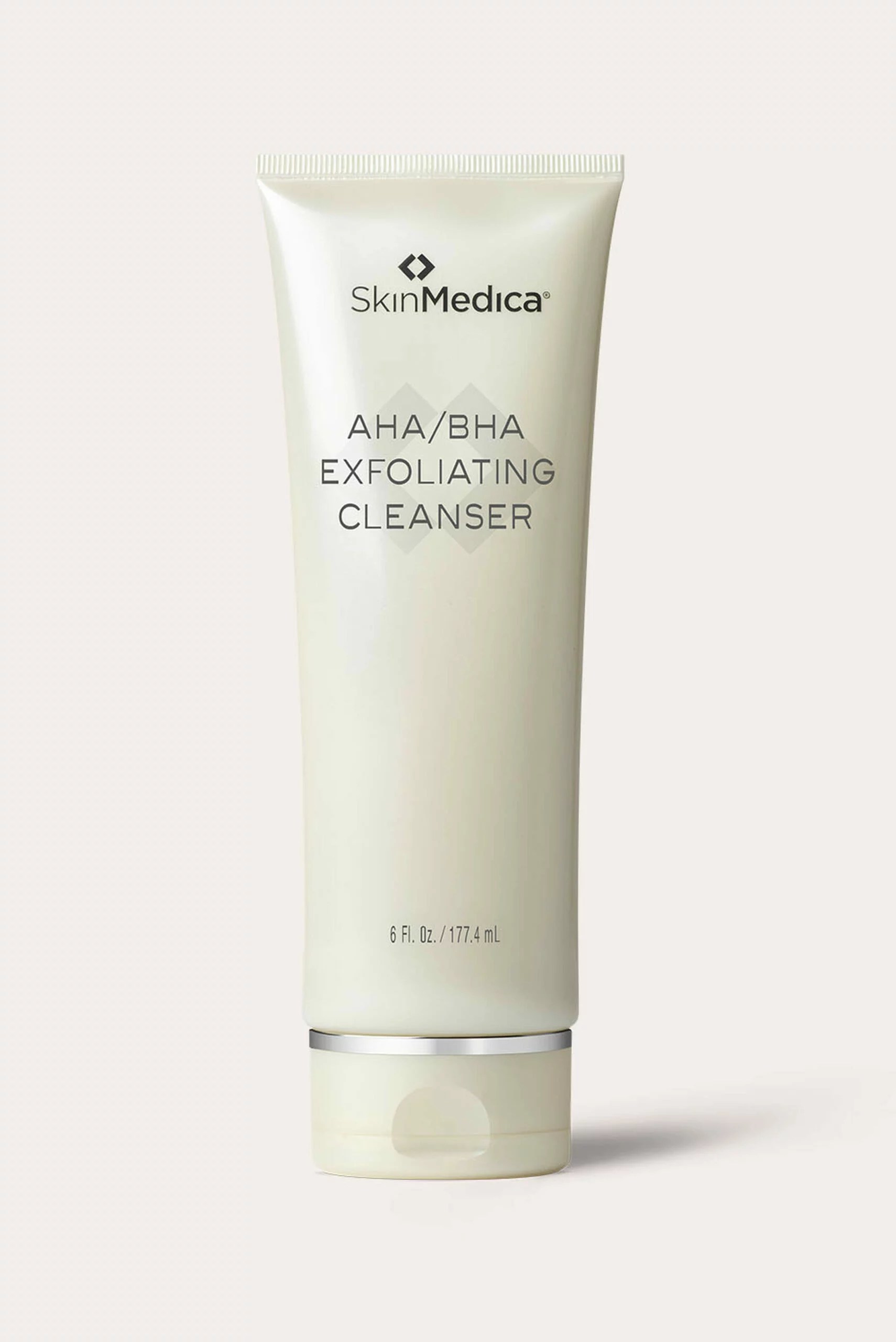A white bottle of SkinMedica cleanser.
