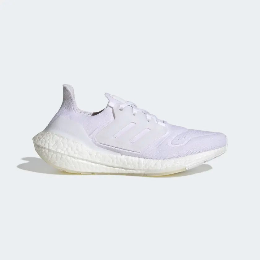 A white and pale lavender Adidas running shoe.