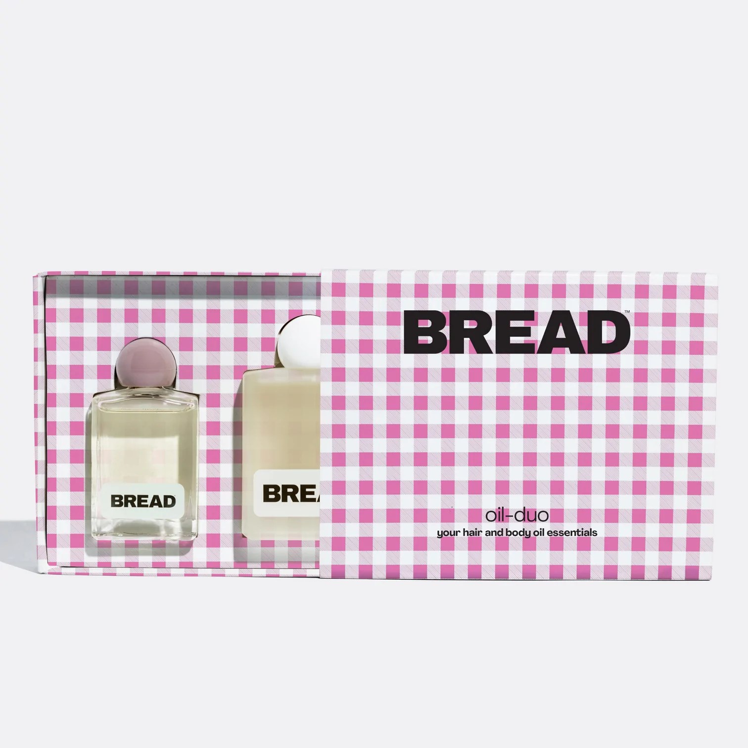 bread beauty supply oil duo in a pink gingham patterned gift box