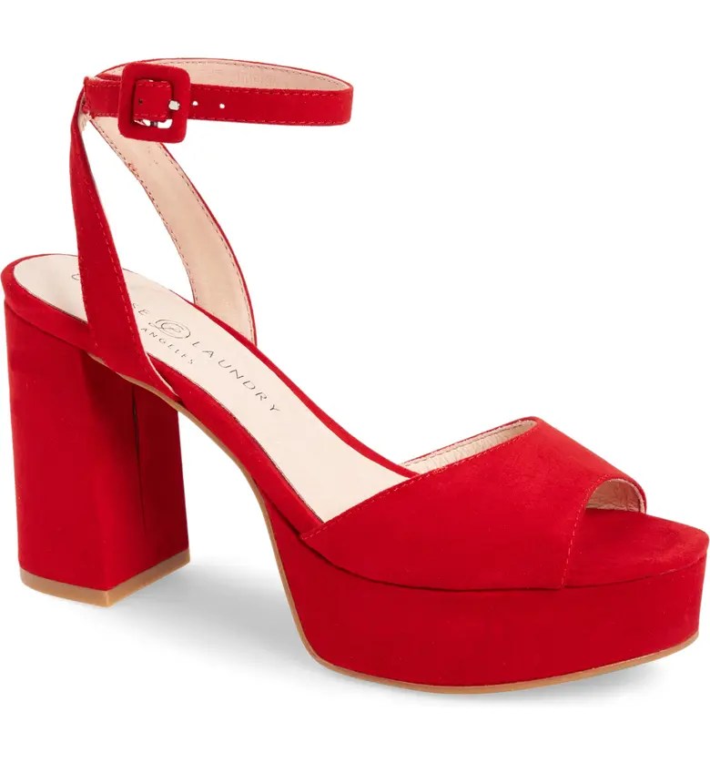 Chinese red high heels for holiday parties on white background