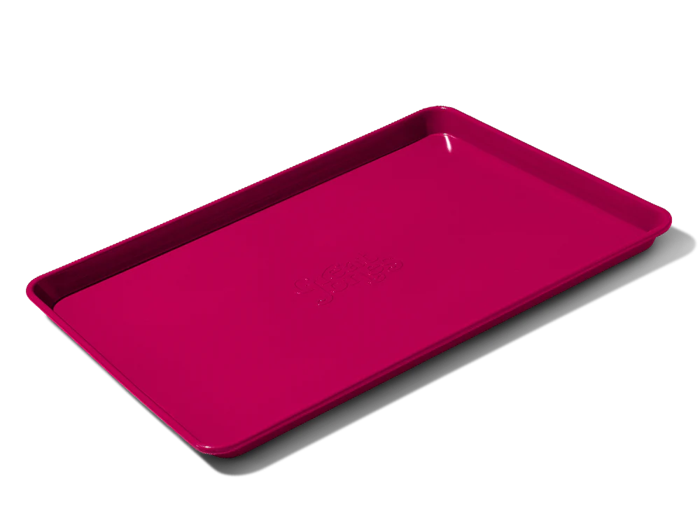 holy sheet pan in pink from great jones black friday sale on a white background