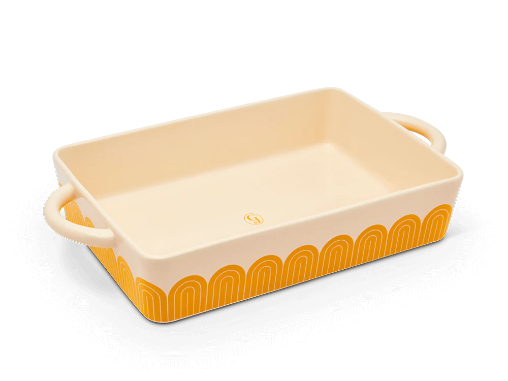 great jones hot dish in mustard on a white background