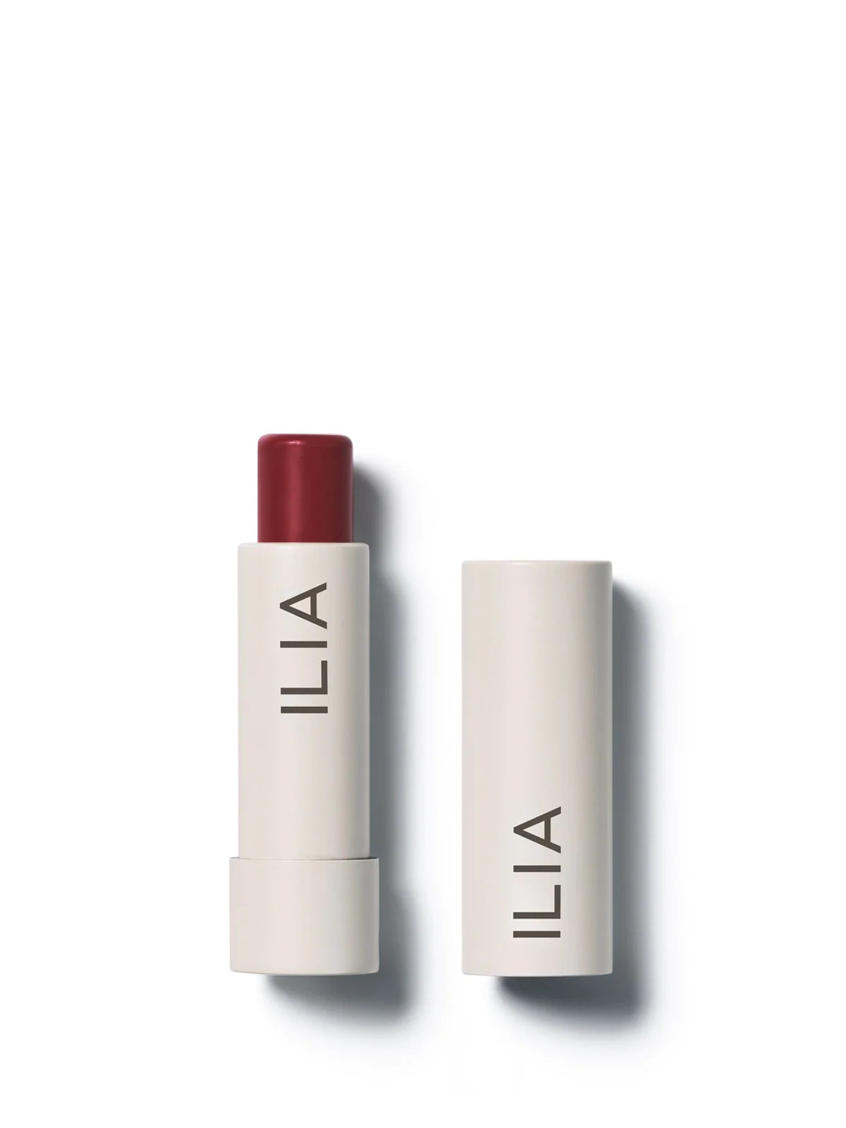 ilia moisturizing oil on white background