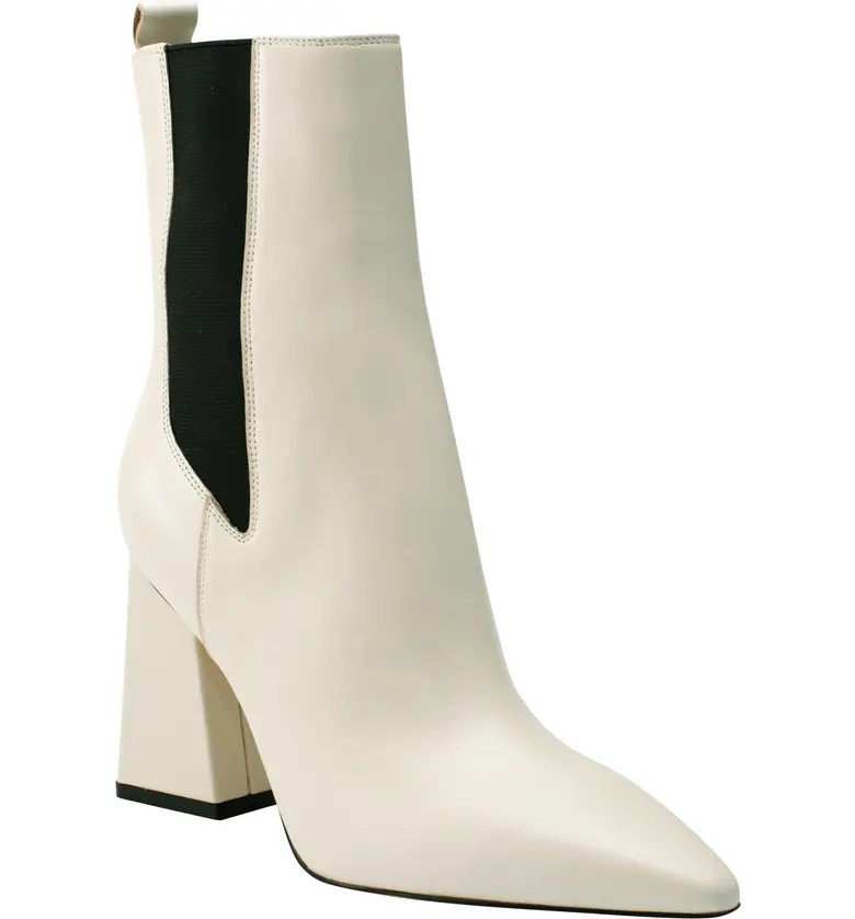 marc fisher ivory heeled boots for holiday parties on a white background