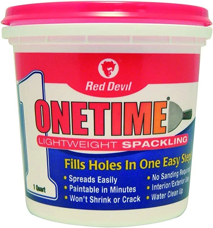 A tub of spackling compound from Red Devil
