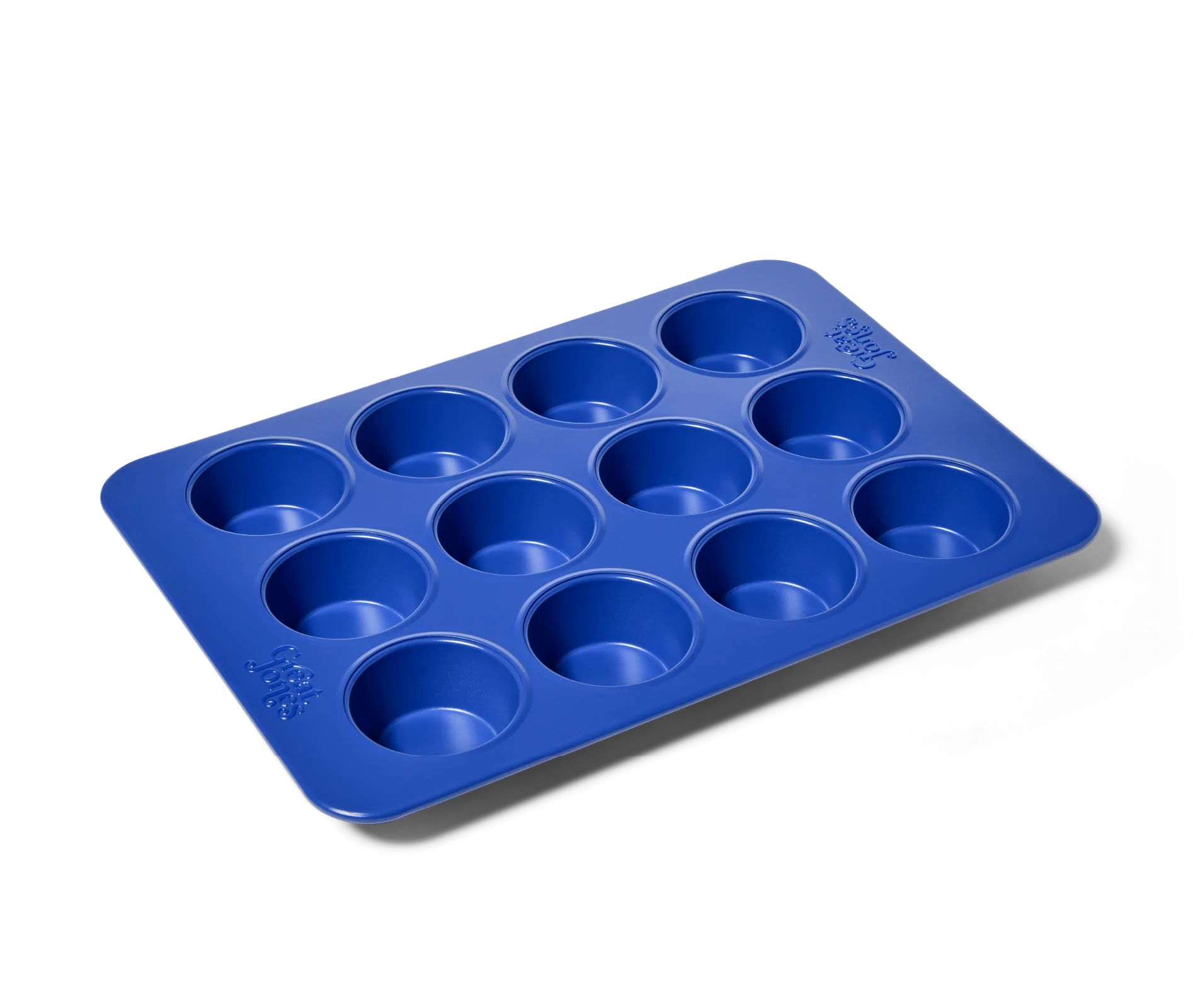 stud muffin muffin pan in blue on a white background
