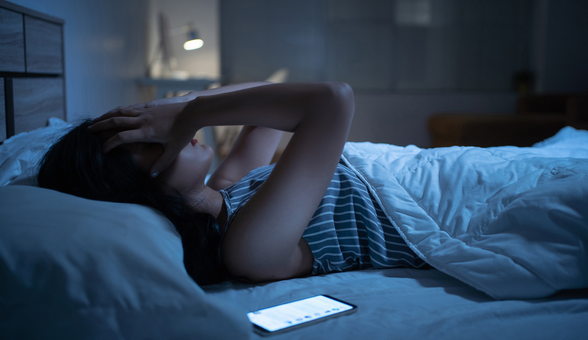 woman in perimenopause dealing with sleep problems and insomnia