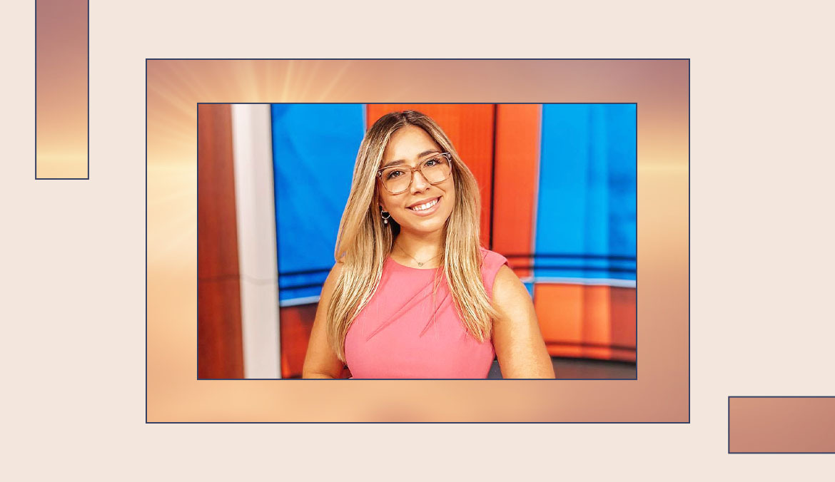 Morning news anchor Sofia Espinosa sits at a desk smiling into the camera before going on live television.