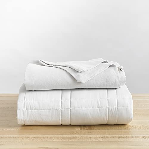 baloo weighted throw blanket on a wood surface, a great work from home wellness gift