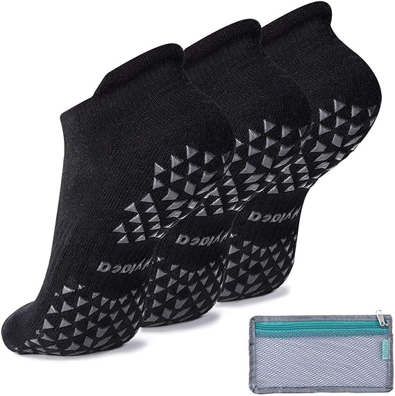 three black hylaea grip socks with a mesh washing bag