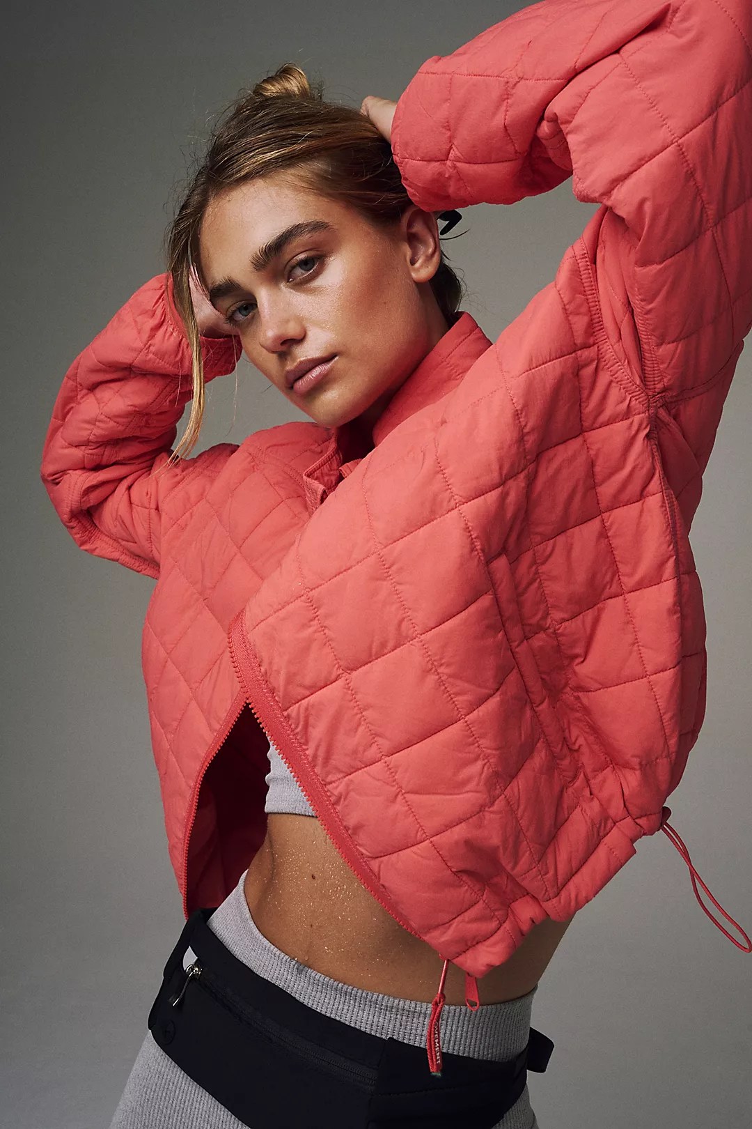 poppy puffer jacket on a model wearing activewear