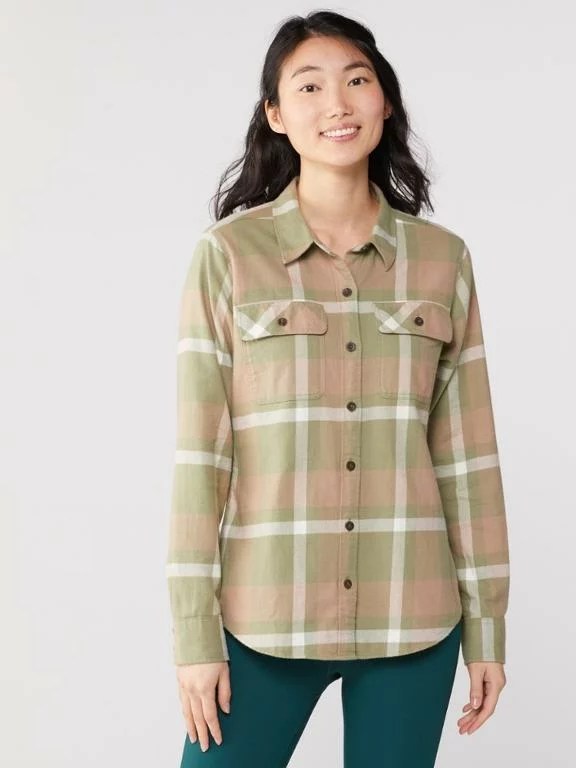 rei holiday warm up sale patagonia flannel in green on a model in front of a grey background