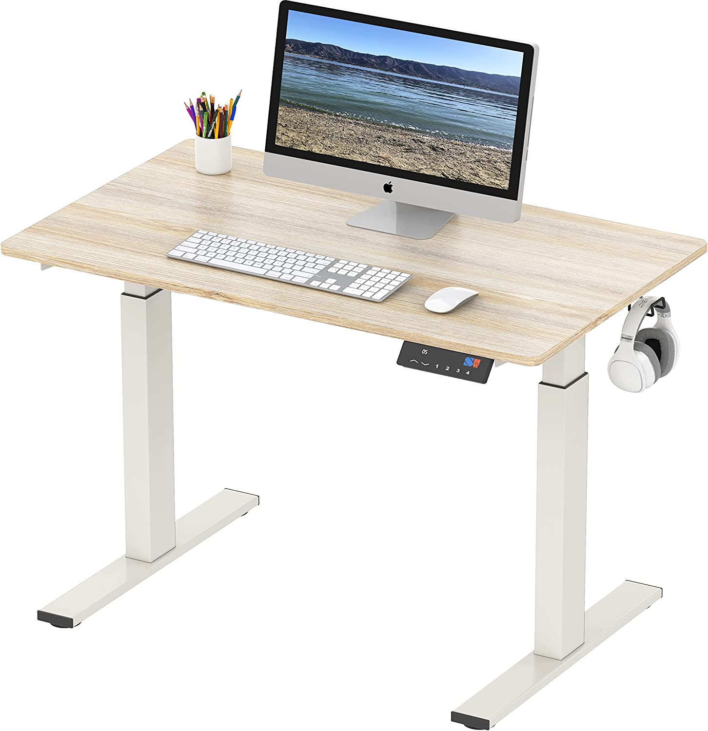 motorized standing desk with a keyboard, mouse, and computer monitor on it, on a white background