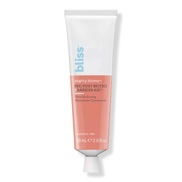 bliss mighty biome moisturizer concentrate tube on a grey background