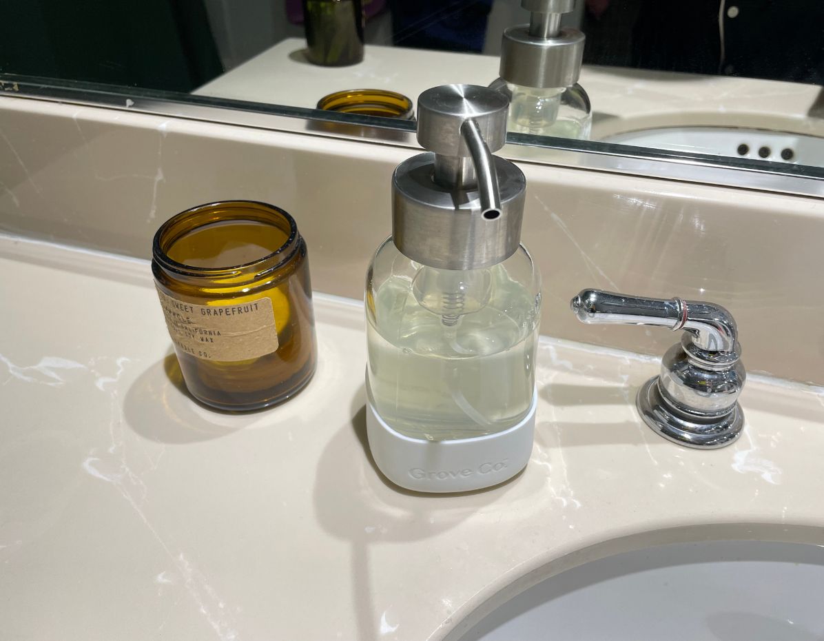 blueland foaming hand soap on bathroom counter from the blueland and grove collaborative review