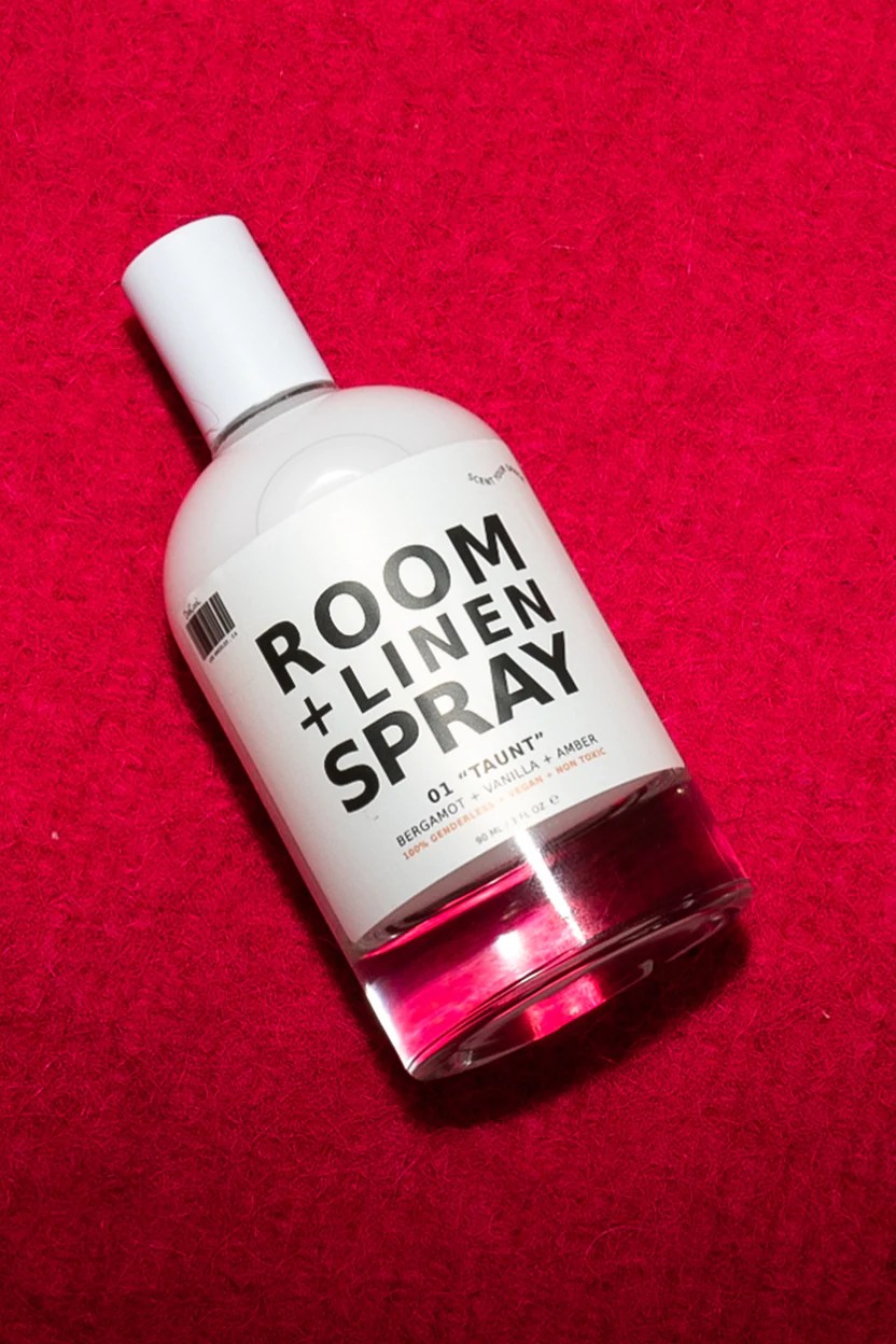 dedcool linen and room spray on a red background