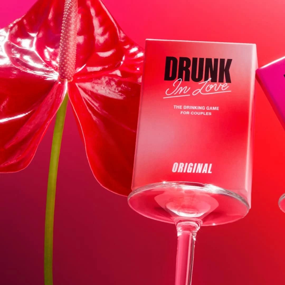drunk in love card game on top of a wine glass, one of the best valentine's day gifts for couples