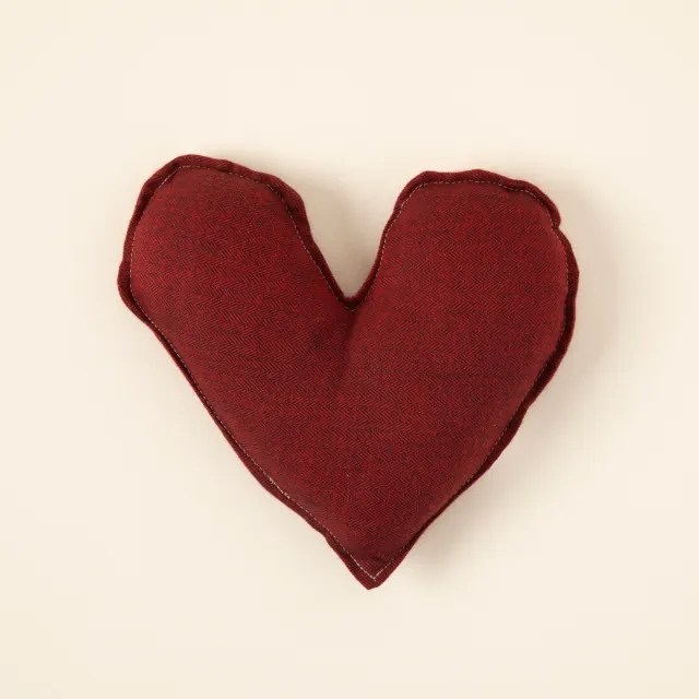 heart of hope pillow on a beige background