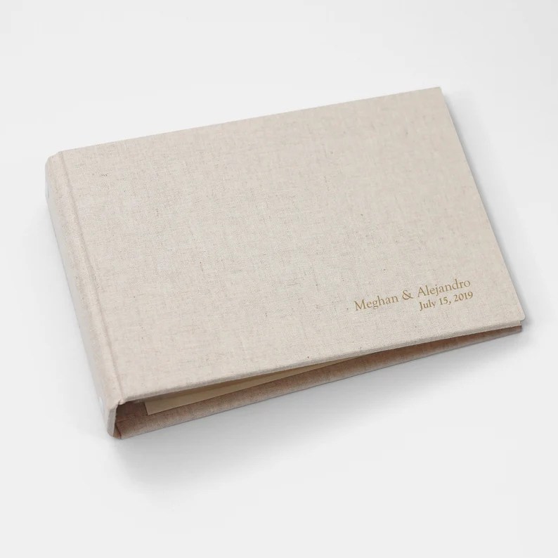 linen photo album on a grey background, a cute valentine's day gift