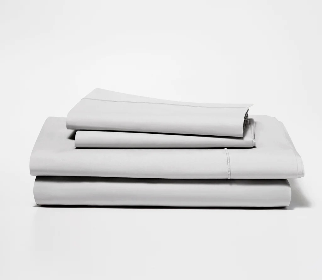 snowe percale sheet set on a light gray background, bed sheets for sex