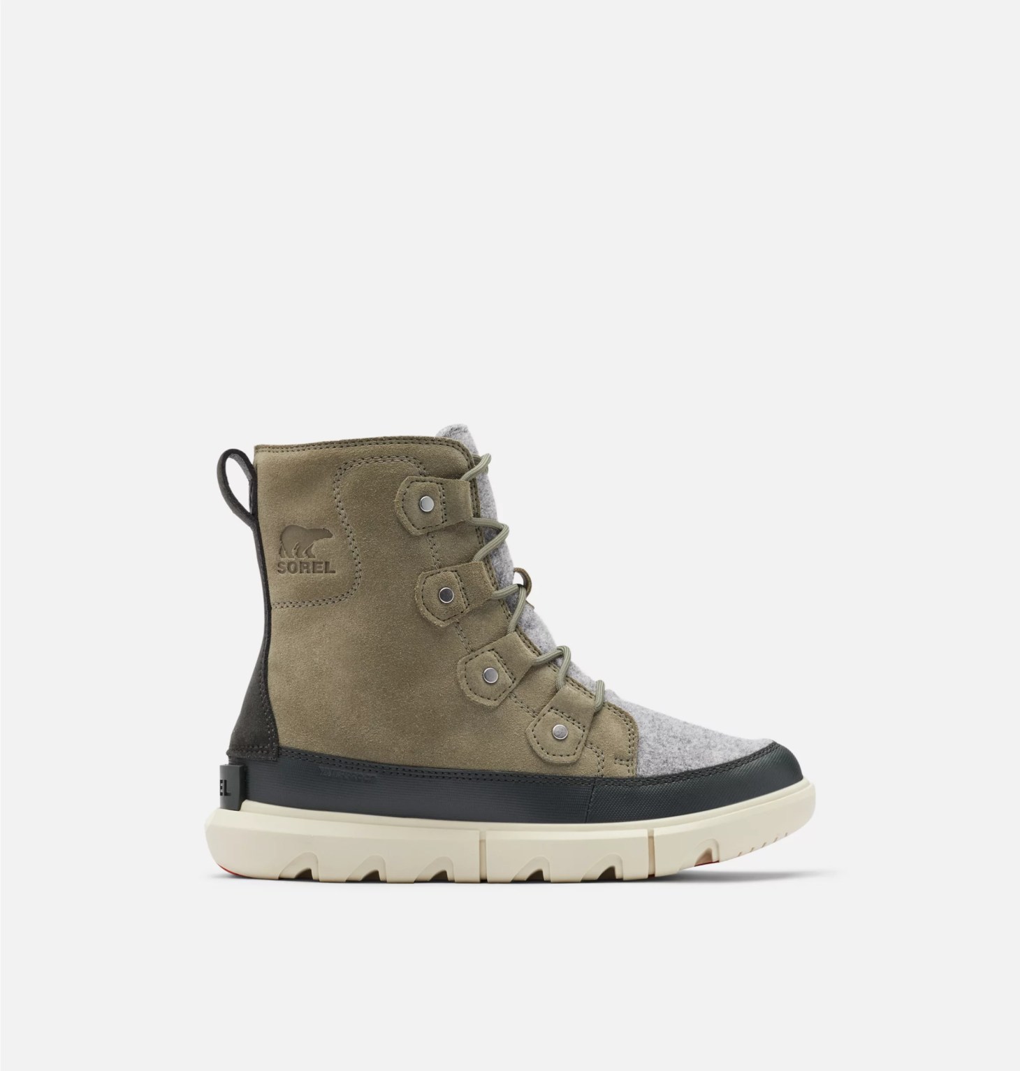 sorel explorer boot in sage and black on a grey background