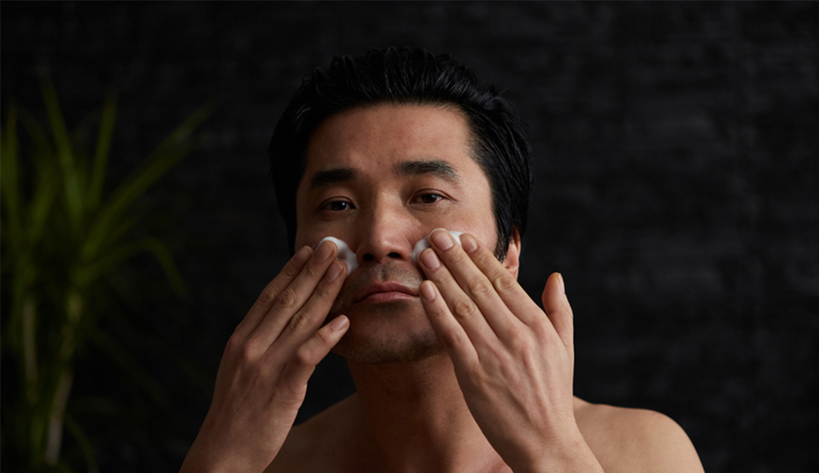 A man washing his face. EltaMD Foaming Facial Cleanser