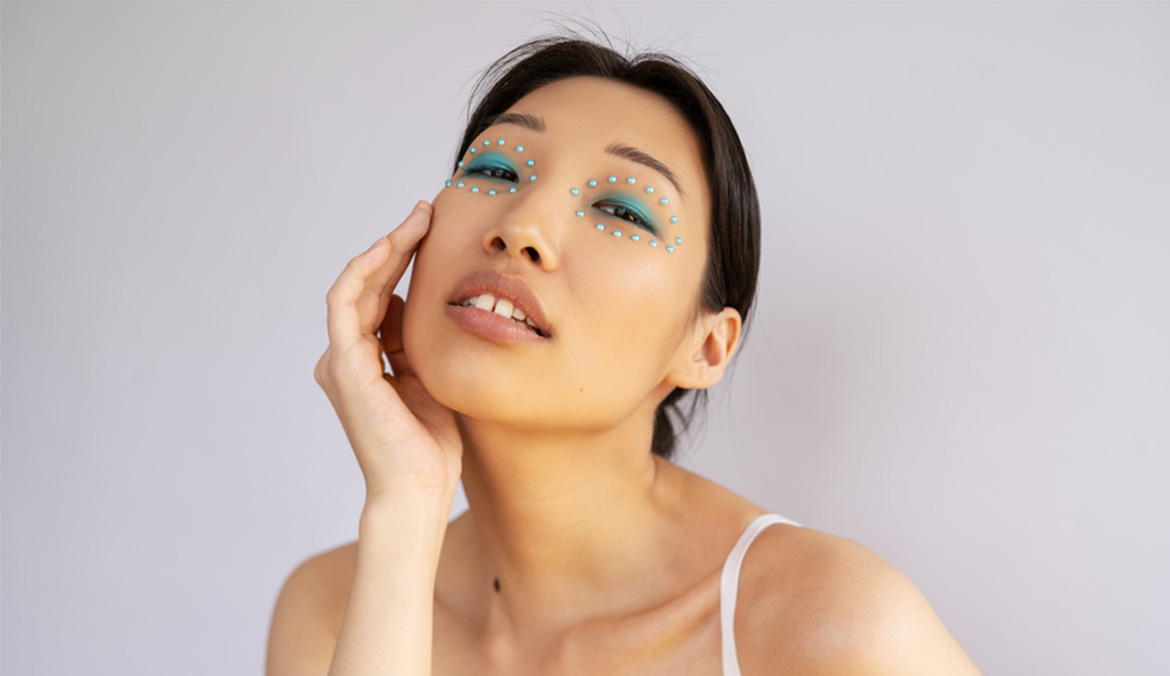 A model with pretty pearl makeup. Mehron Skin Prep Pro