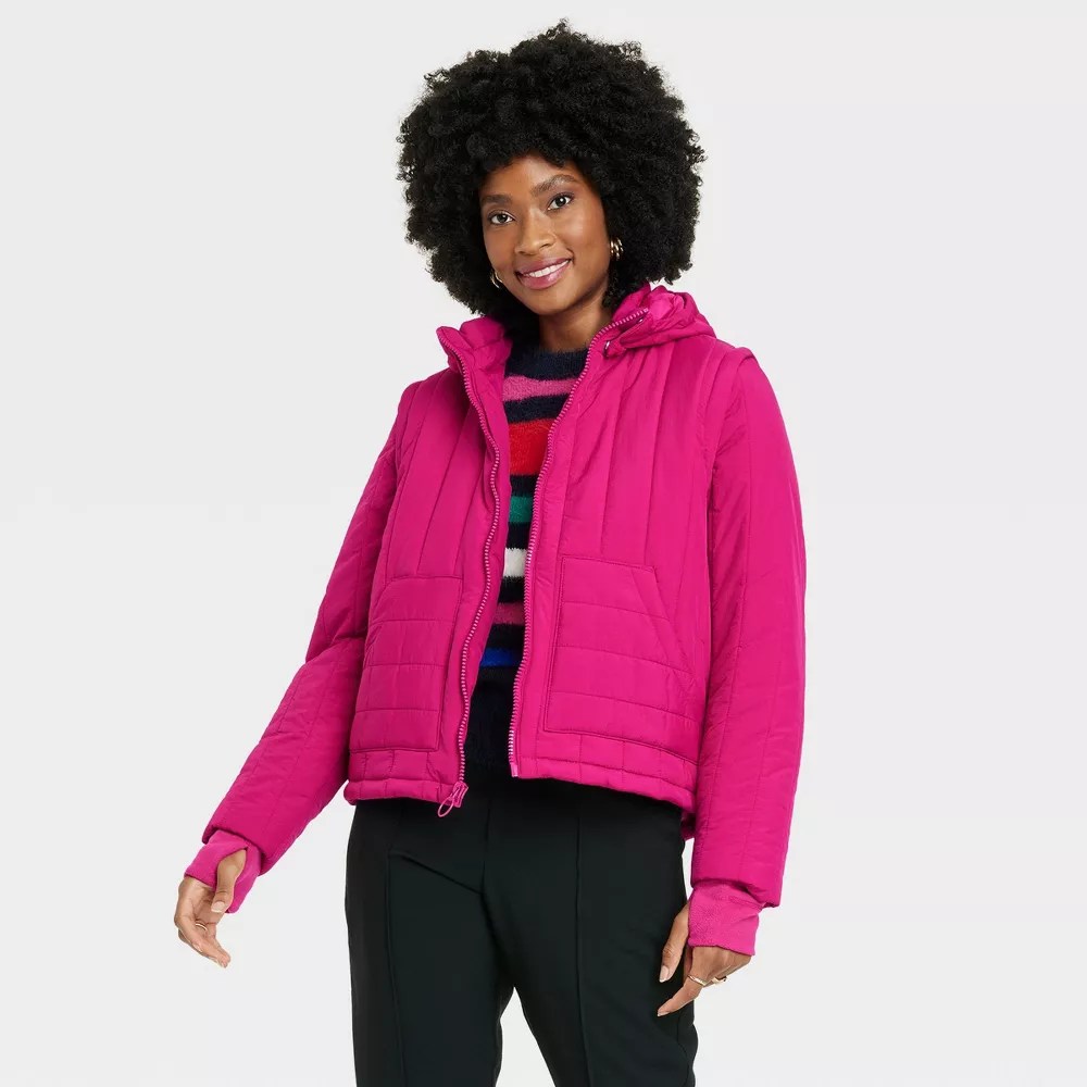 model wearing a new day versatile puffer jacket in red