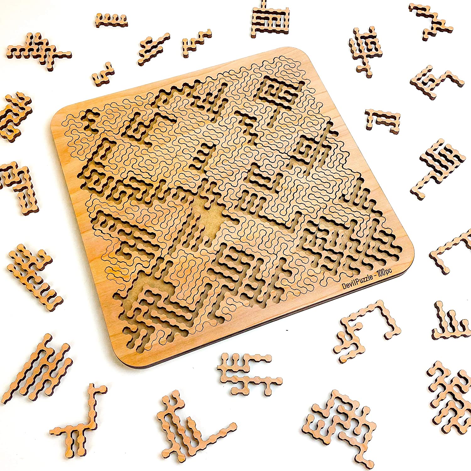 mind bending wooden jigsaw puzzle on a white background