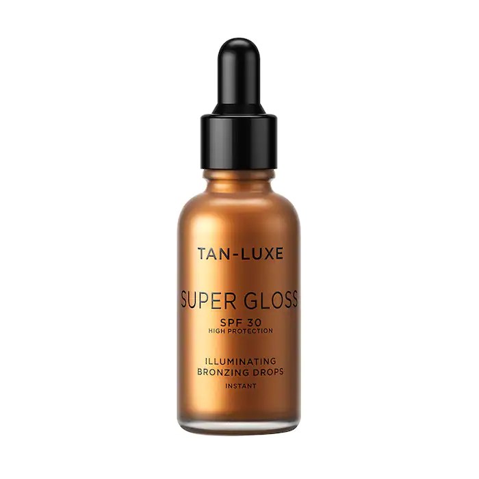 tan luxe super gloss face dropper bottle on a white background