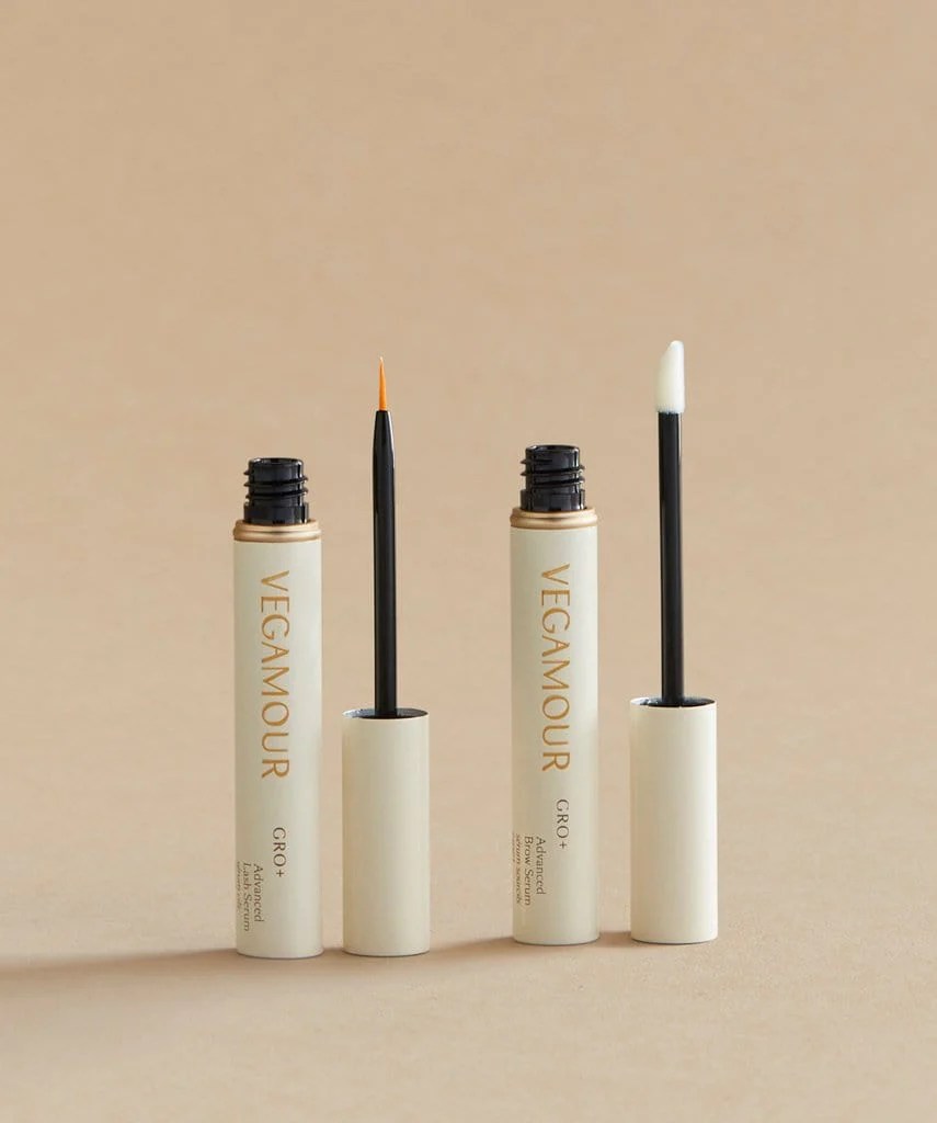 vegamour gro+ advanced lash and brow serum on a beige background