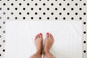 Yes, You Have To Actively Wash Your Feet in the Shower To Keep Them Clean, According to a Podiatrist