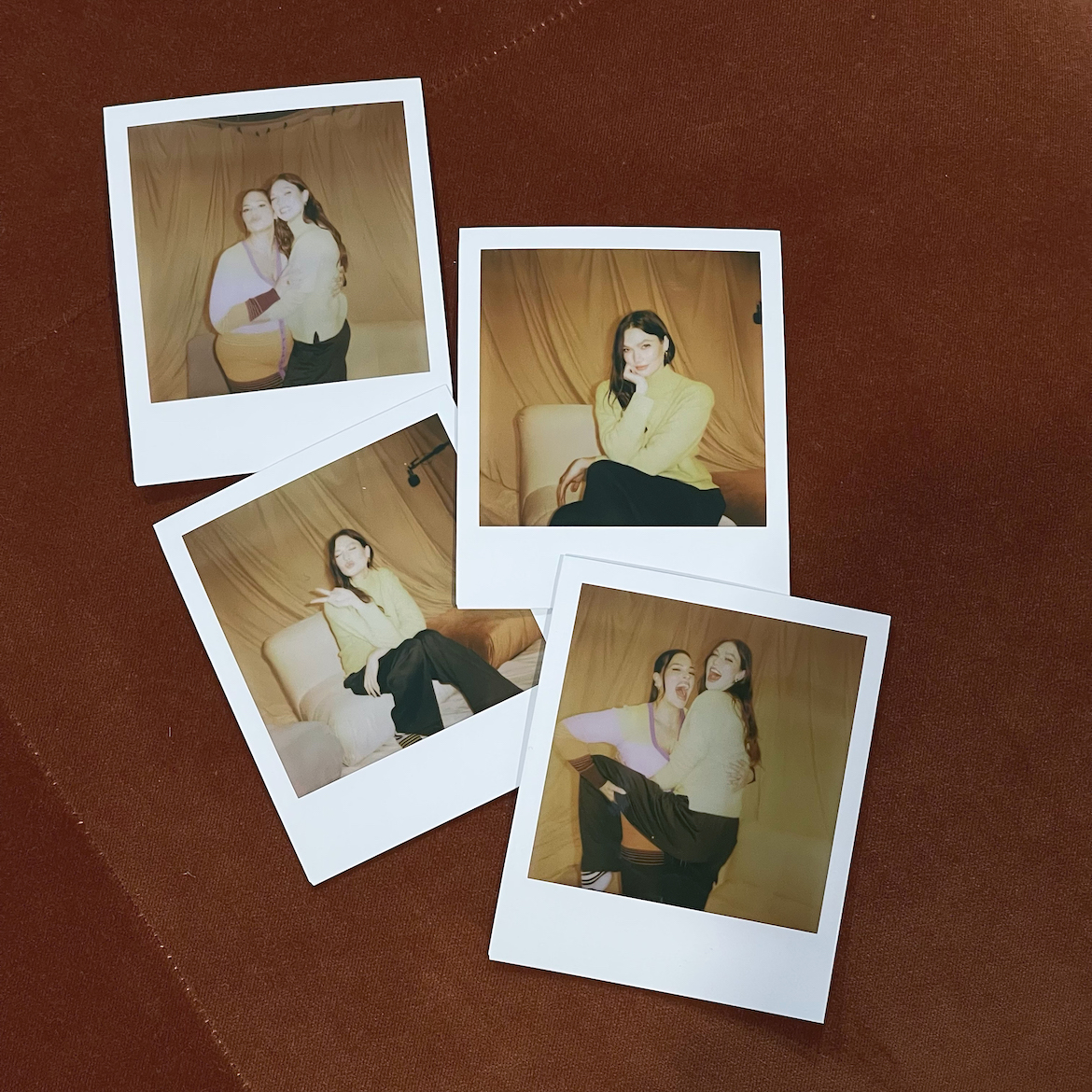 A series of Polaroid photographs showing models Karlie Kloss and Ashley Graham. 