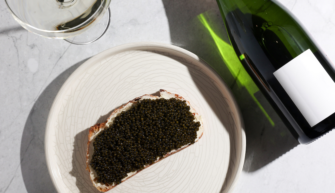 sandwich with black caviar and champagne.