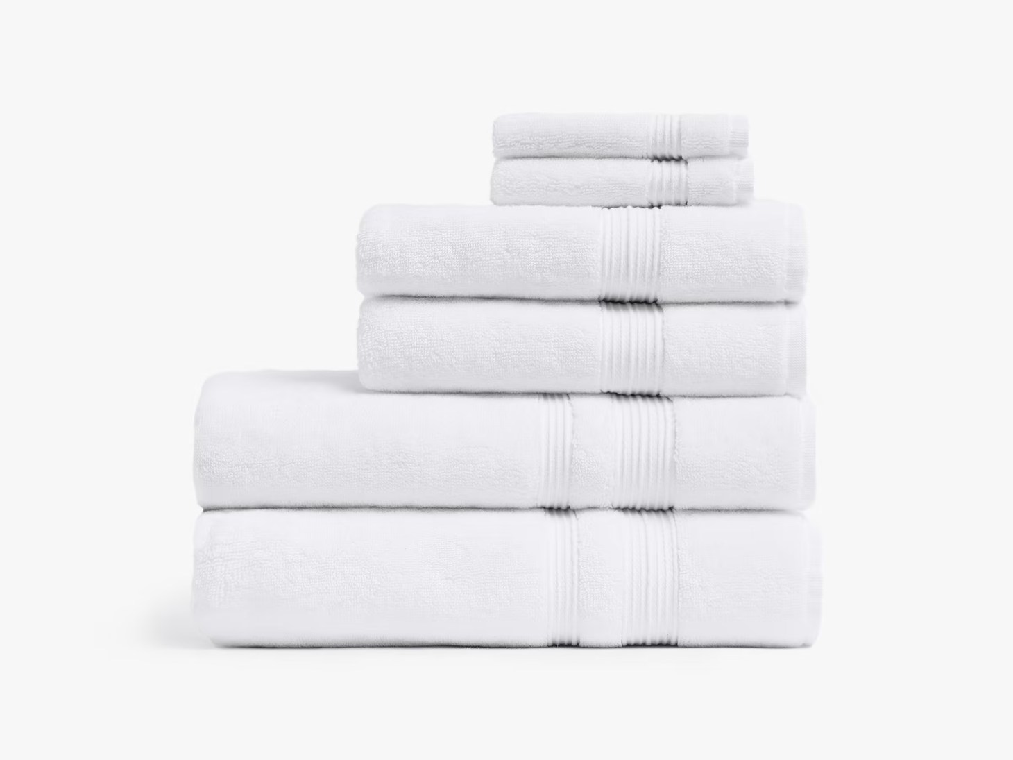 a stack of parachute turkish cotton towels, one of the best bath towels