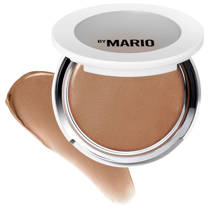 makeup by mario transforming skin enhancer, a natural looking bronzer and contour, on a white background