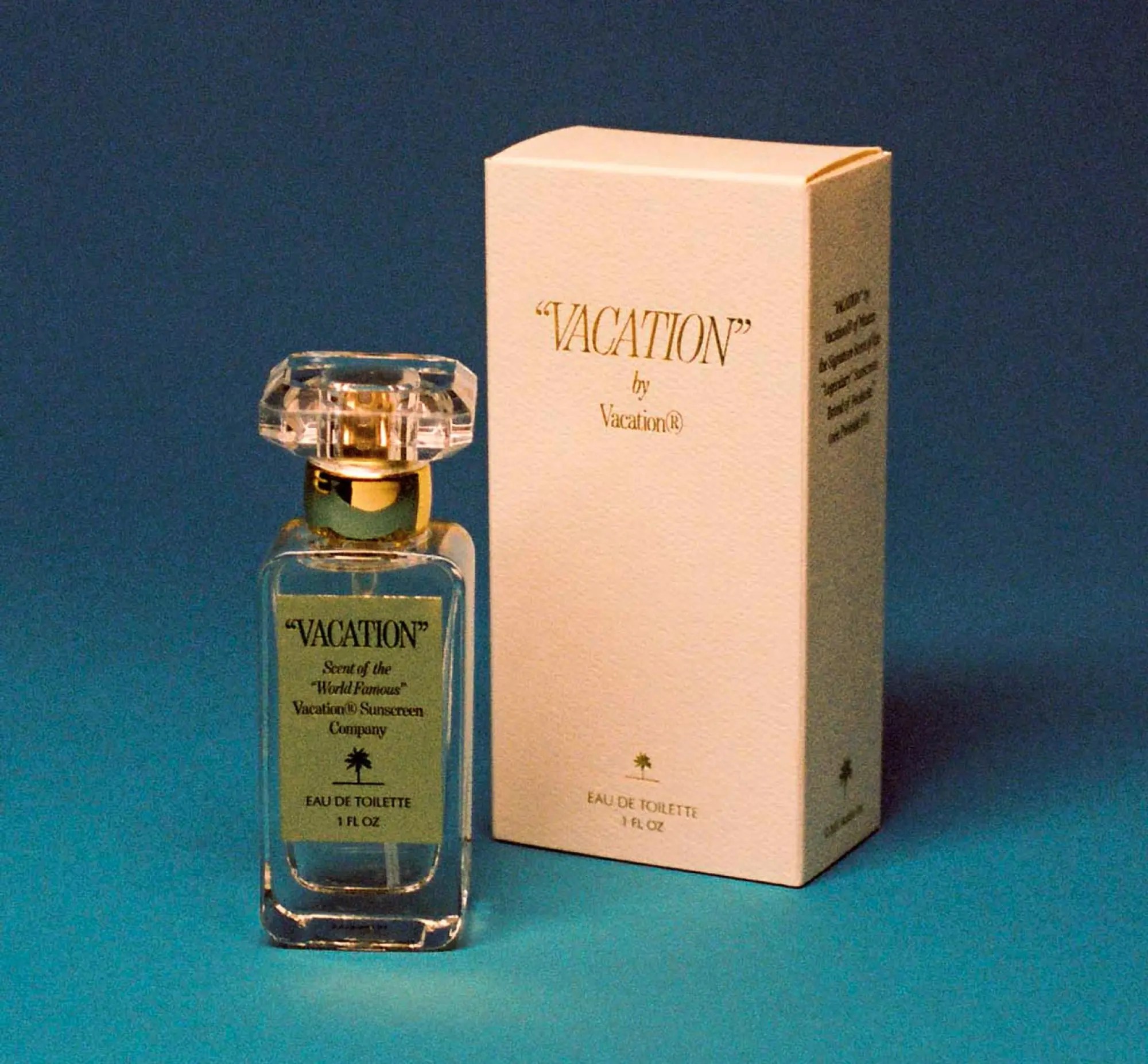 vacation inc. vacation scent bottle and box on a blue background
